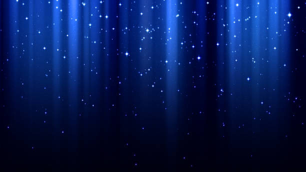 Blue abstract background with rays of light, sparkles, northern lights, night starry sky stock photo