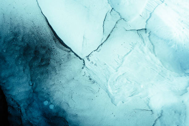 blue acrylic ink marble texture fractured ice Blue acrylic ink. Marble texture. Fractured ice design. Frozen water surface abstract background. Crystal with streak fleck pattern. Natural mineral stone surface. aqua menthe photos stock pictures, royalty-free photos & images