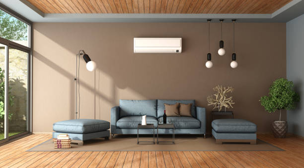 Blue and brown living room with air conditioner stock photo