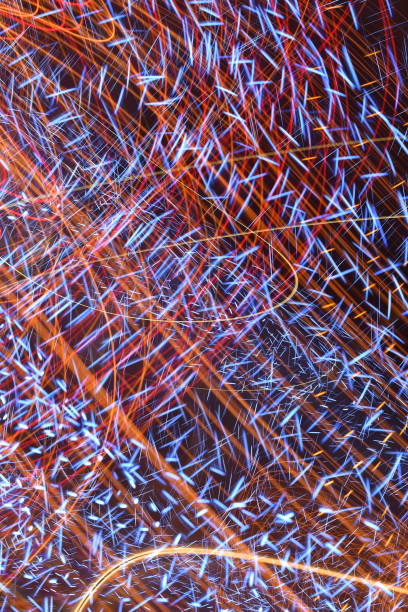 Blue and Orange Light Streaks Long exposure motion steven harrie stock pictures, royalty-free photos & images