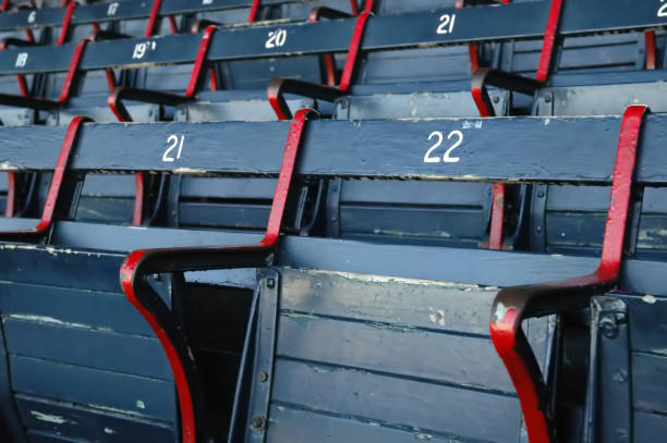 Blue and red empty stadium seats stock photo