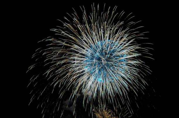 Blue and white fireworks stock photo