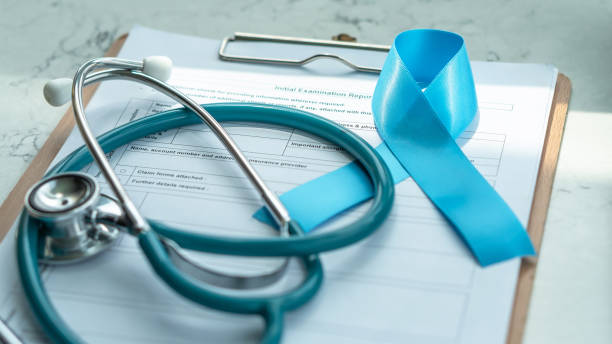 Blue awareness ribbon for prostate cancer, men health and diabetes in November with light blue bow color on medical doctor record, male patient healthcare concept Blue awareness ribbon for prostate cancer, men health and diabetes in November with light blue bow color on medical doctor record, male patient healthcare concept diabetes awareness stock pictures, royalty-free photos & images