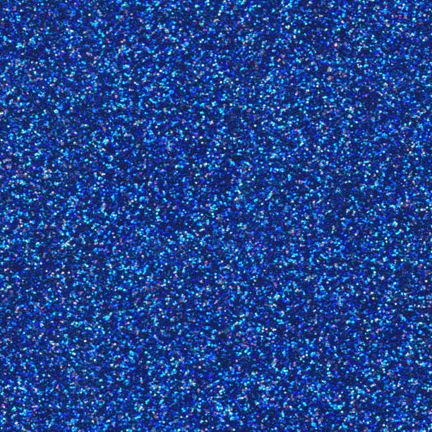 Blue background with glitter. Seamless texture. Blue pattern with fine sparkles. Festive luxury design element stock photo