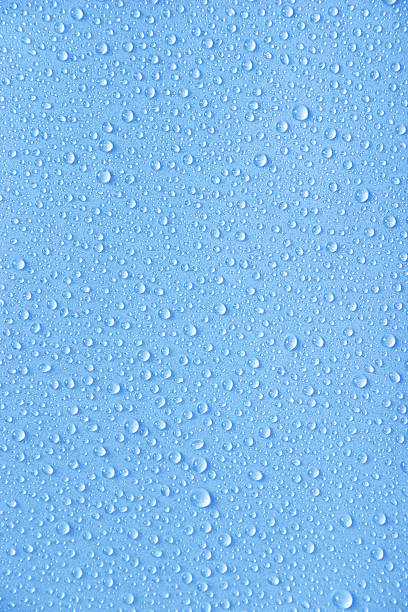 Blue Beads of Water Beads of rain. High resolution bead stock pictures, royalty-free photos & images