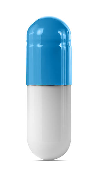 Blue Capsule Blue capsule on white background. Clipping path included. pill stock pictures, royalty-free photos & images