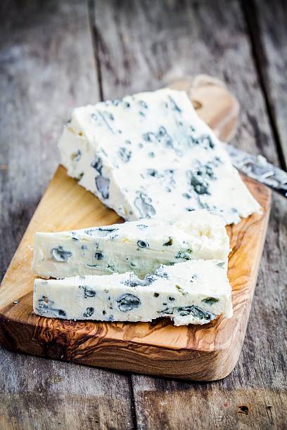Blue cheese slices stock photo