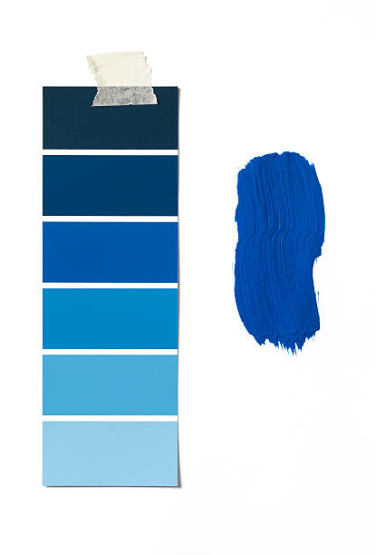 Blue colour swatch and paint Wall with blue swatch and paint on wall color swatch stock pictures, royalty-free photos & images