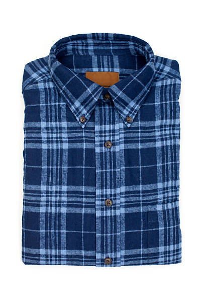 Blue Flannel Shirt New folded man's flannel shirt, isolated on white. plaid shirt stock pictures, royalty-free photos & images