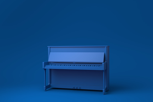 Blue Grand piano in blue background. minimal concept idea creative. monochrome. 3D render.