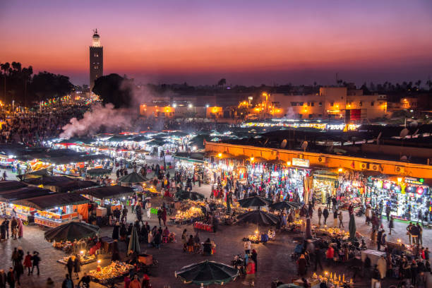 blue hour Djemaa El Fna Square Koutoubia Mosque Marrakech Morocco Evening Djemaa El Fna Square with Koutoubia Mosque, Marrakech, Morocco koutoubia mosque stock pictures, royalty-free photos & images