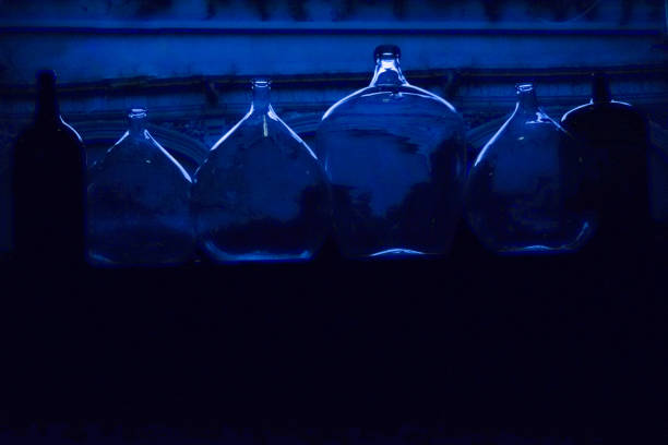 Blue Jars in the dark stock photo