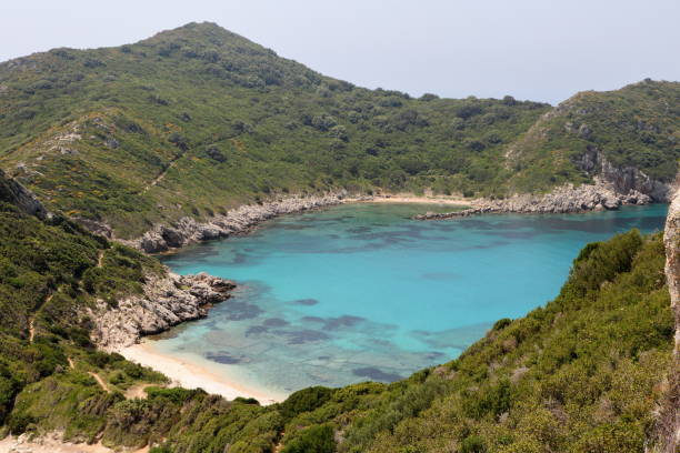 Blue lagoon of Porto Timoni beach in Corfu greece stock photo