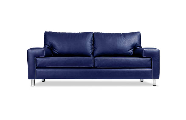 A blue leather sofa with silver legs stock photo