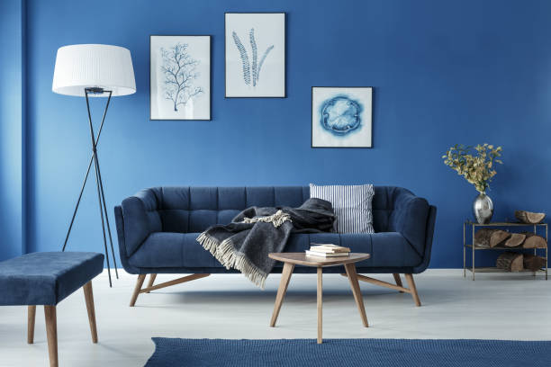 Blue living room Blue stylish elegant retro living room with sofa decoration stock pictures, royalty-free photos & images