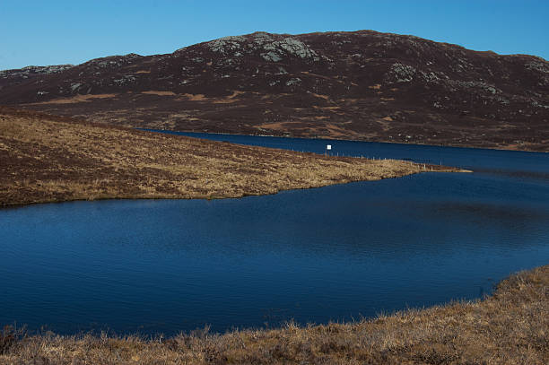 Blue loch in Scottish Highlands stock photo