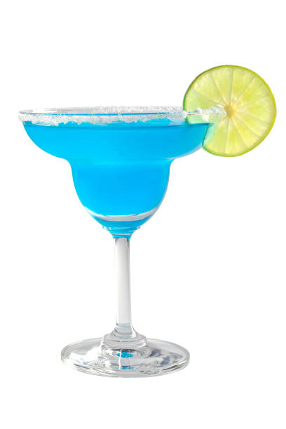 Blue Margarita cocktail with lime and salt isolated on white background. Cocktails drink concept. stock photo
