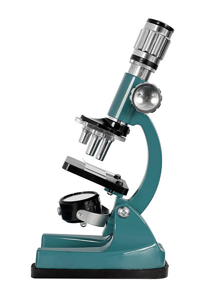 Blue microscope against white background stock photo