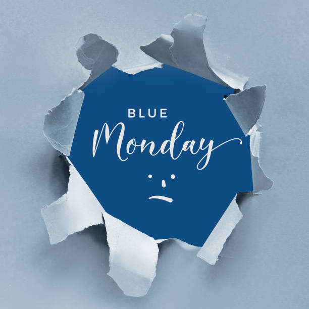 синий понедельник концепции фона с текстом и грустной улыбкой мультфильма в разорванной бумажной дыре. светлый и классический синий двухв� - blue monday стоковые фото и изображения