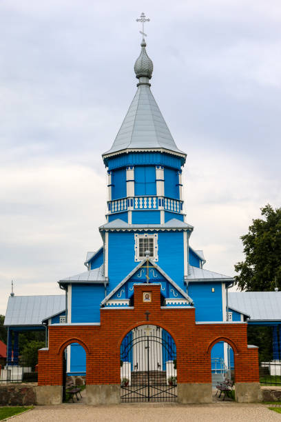 blue orthodox church of the holy cross in narew in north-east poland stock photo
