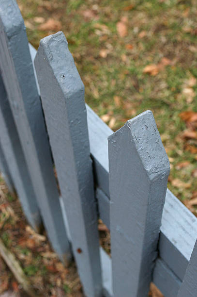 blue picket fence stock photo