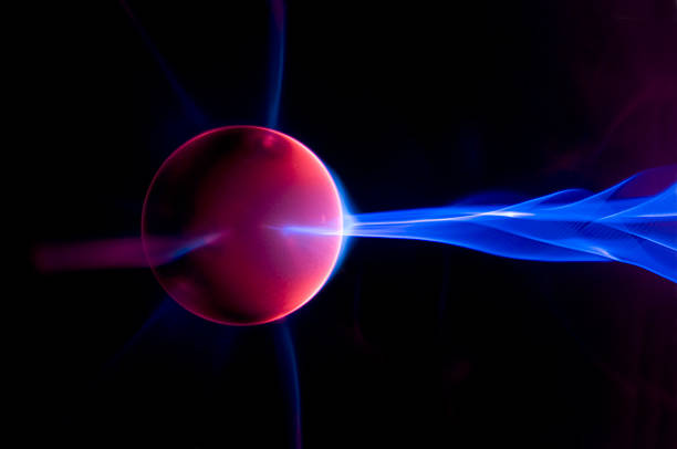Blue Plasma Glowing electrical energy (Tesla Coil) plasma ball stock pictures, royalty-free photos & images