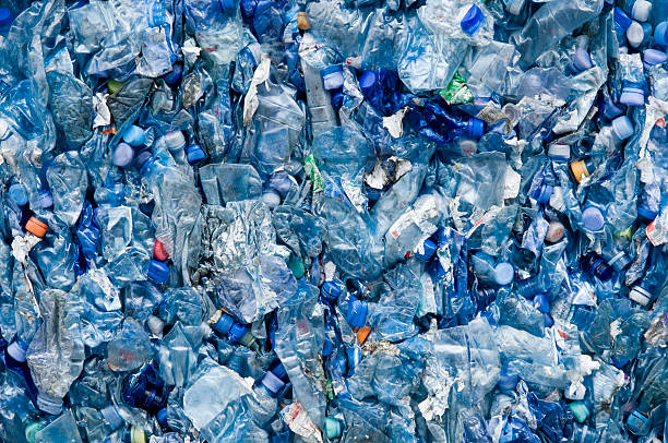 blue plastic garbage - afval stockfoto's en -beelden