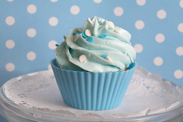 Blue polka dot cupcake. stock photo