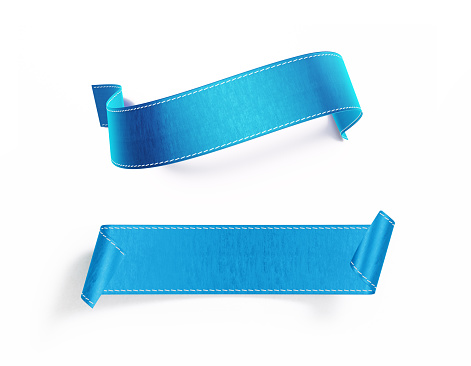 Blue ribbon pair sitting over white background. Horizontal composition with  copy space.