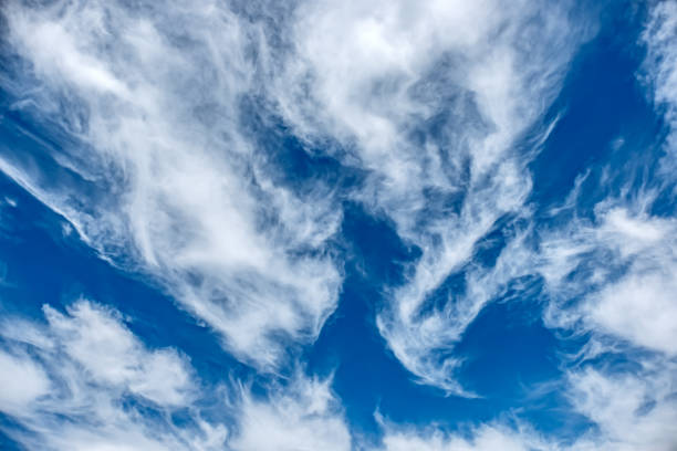 Blue Sky Background And White Clouds stock photo
