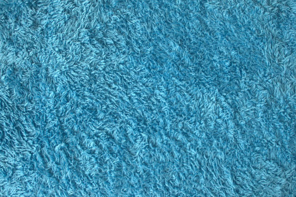 Blue soft fluffy fleece long open sling terry cloth fabric material texture stock photo