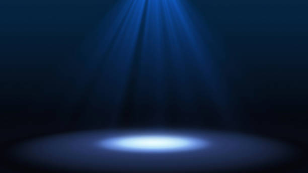 Blue spotlight on stage performance in a theater isolated on black background, mock up, in futuristic technology concept. Illustration background. Blue spotlight on stage performance in a theater isolated on black background, mock up, in futuristic technology concept. Illustration background. spotlight stock pictures, royalty-free photos & images