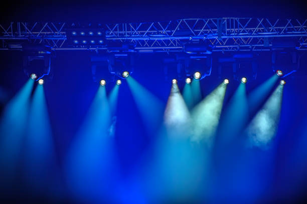 Blue spotlights on stage stock photo