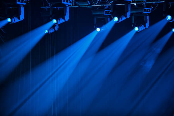 Blue stage spotlights stock photo