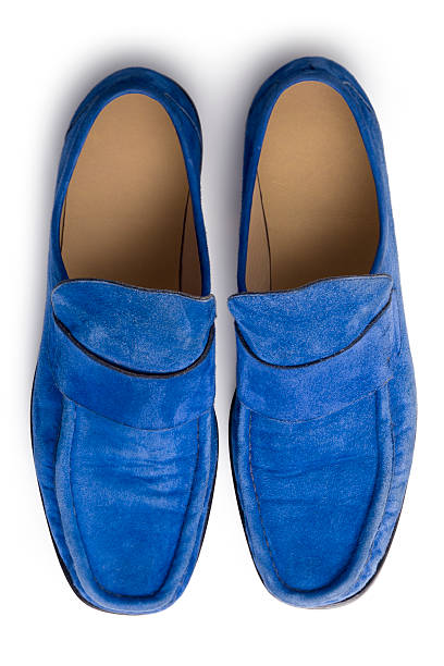 Blue suede shoes from above stock photo