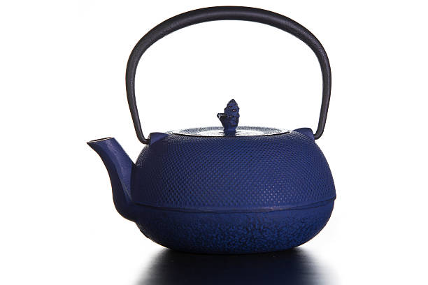 Blue teapot stock photo
