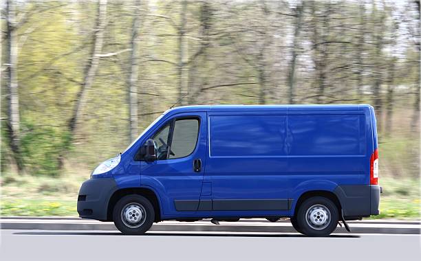 Blue Van Speeding stock photo