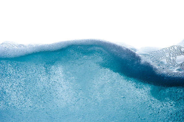 Blue water vawe Blue water wave abstract background isolated on white sea foam stock pictures, royalty-free photos & images