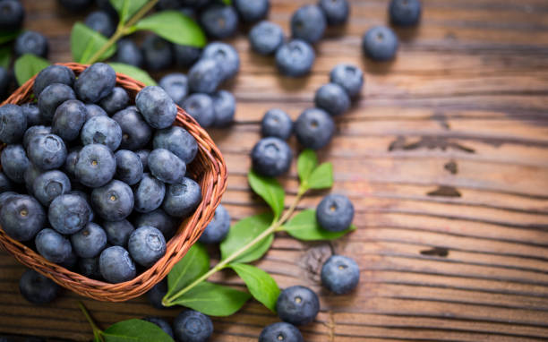 Blueberries in the basket Blueberries in the basket blueberry stock pictures, royalty-free photos & images