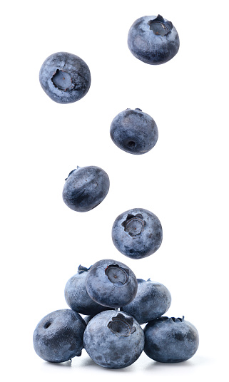 Blueberry drops on a heap close-up on a white background. Isolated