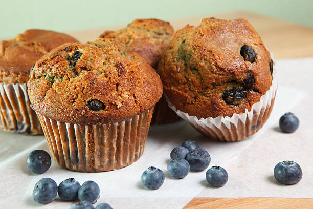 Blueberry Muffins on Wax Paper stock photo