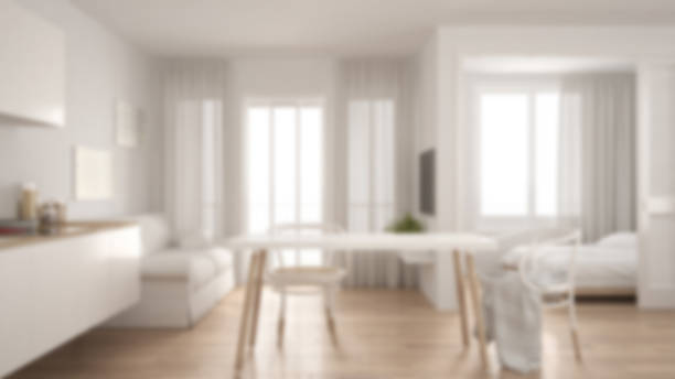 Blur background interior design, scandinavian kitchen with sofa and table, wooden parquet floor stock photo