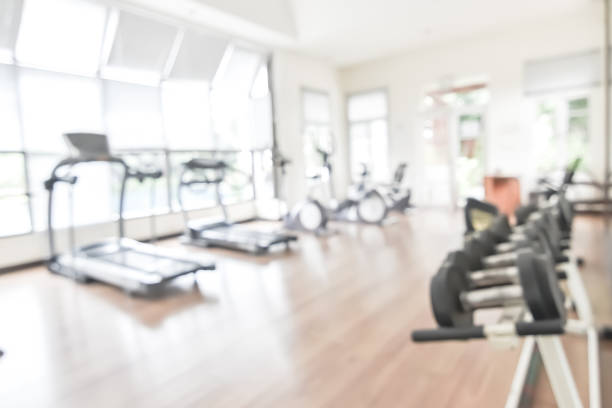 Blur gym background fitness center or health club with blurry sports exercise equipment for aerobic workout and bodybuilding  health club stock pictures, royalty-free photos & images