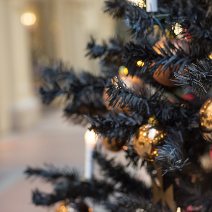 Blurred Abstract Christmas Tree With Gothic Dark Decor Golden Balls Candles On Dark In Interiors Xmasclose Up Stock Photo Download Image Now