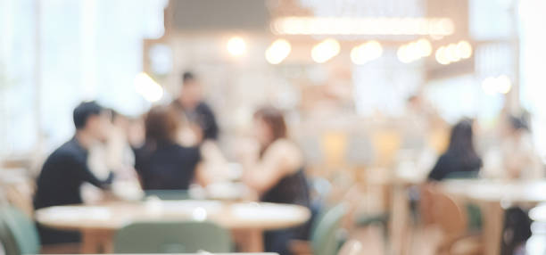 Blurred background : blur restaurant with people on bokeh light background, banner stock photo