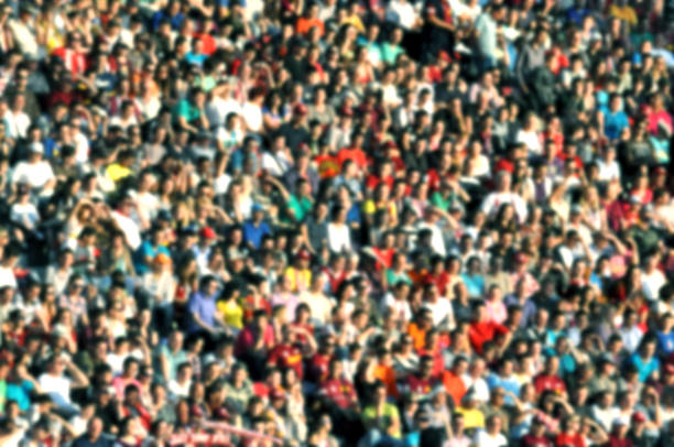 Blurred crowd of spectators in a stadium stock photo