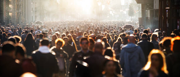 Blurred crowd of unrecognizable at the street Blurred crowd of unrecognizable at the street busy stock pictures, royalty-free photos & images