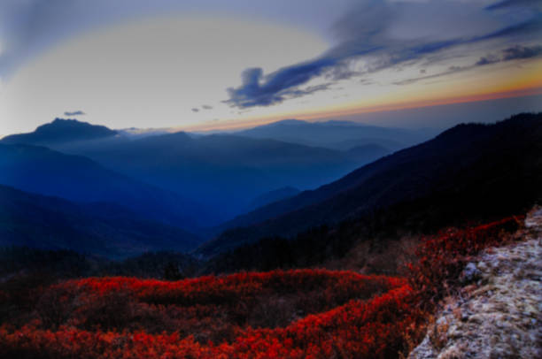 Blurred image of Dawn at Lungthang, Himalayan mounatins, Sikkim, India stock photo