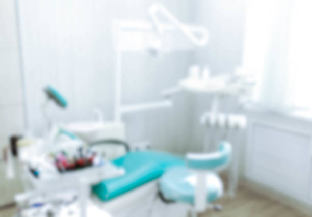 Blurred image of the dentist office, medical background. Dentist cabinet. Blurred image of the dentist office, medical background. Dentist cabinet. dentists office stock pictures, royalty-free photos & images