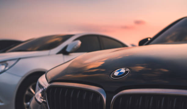 bmw car on sunset sky. august 20 in 2018, seoul in south republic korea. bmw car on sunset sky. bmw is germany vehicle company in global. brand name stock pictures, royalty-free photos & images